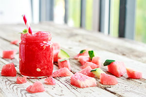fruit slush served as a drink or a dessert in a glass jar